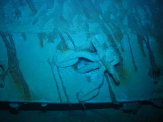 Ship's port anchor on inverted bow